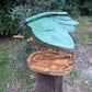 Vogelhaus Naturform mit grünem Dach