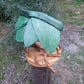 Vogelhaus Naturform mit grünem Dach