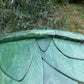 Vogelhaus Naturform mit grünem Dach